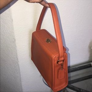 Doris Day Coach turn lock flap evening purse.